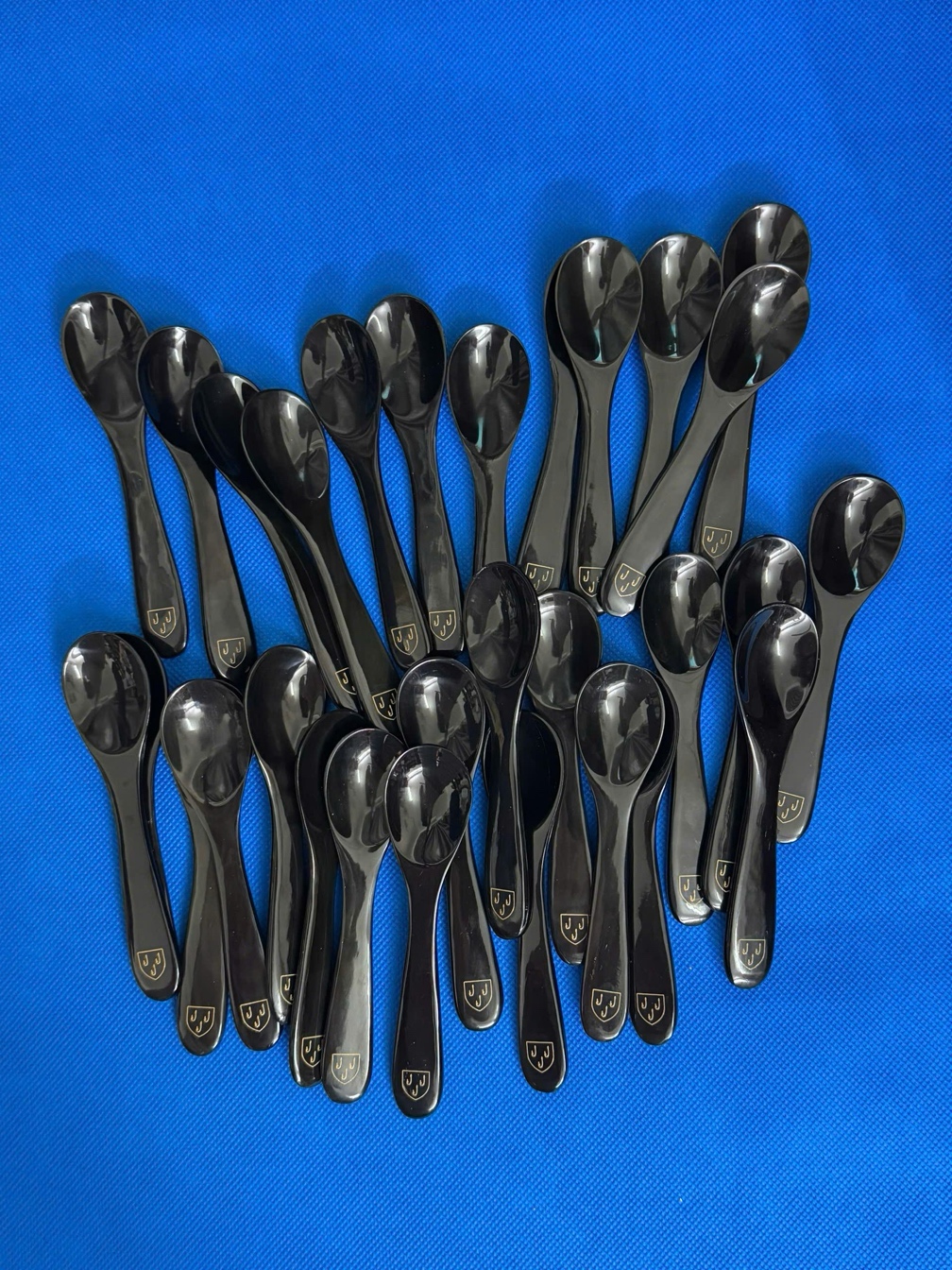Engraved black horn caviar spoons from The Dapper Swede